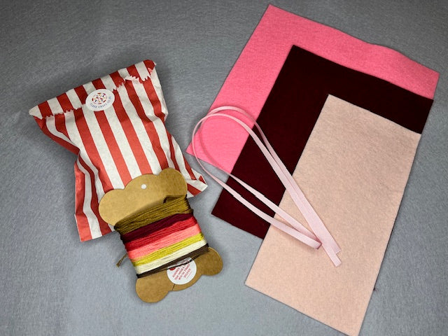 100% wool felt sheets, threads, ribbon and toy stuffing