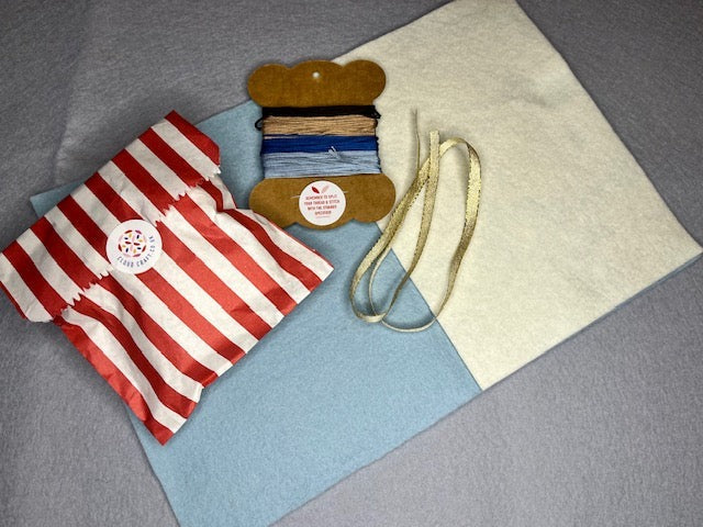 100% wool felt sheets, threads, some ribbon and a bag of toy stuffing